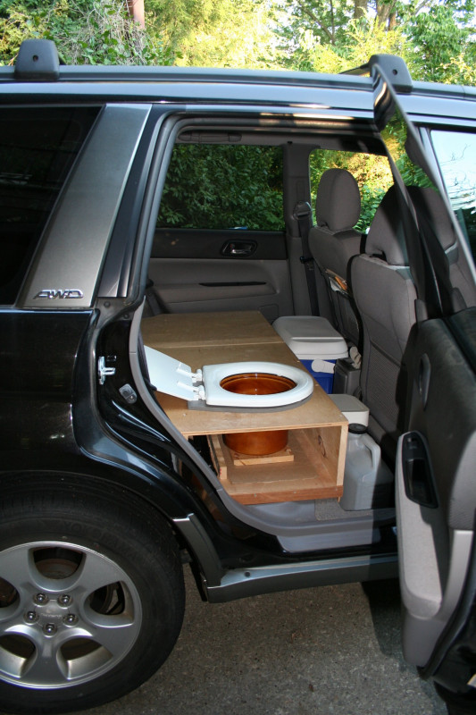 suv-camping-adding-a-toilet-to-subaru-forester-for-rving-bike-racks-solar-panel-french-press-led.jpg